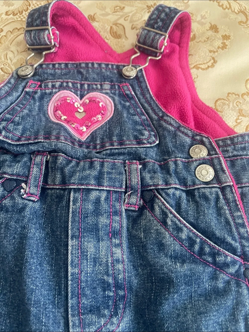 The Children's Place Denim Overalls with Hot Pink Trim and Heart Patch